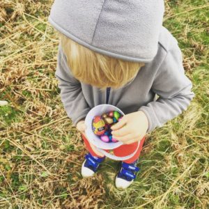 Little boy with basket of Easter Eggs at Loch an Eilein Easter Egg Hunt Rothiemurchus